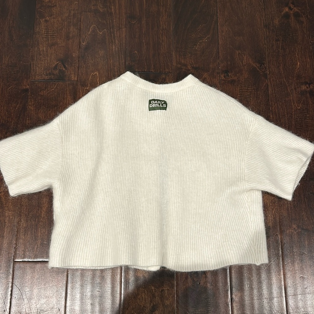 Daily drills single button short sleeve sweater in cream xs/s